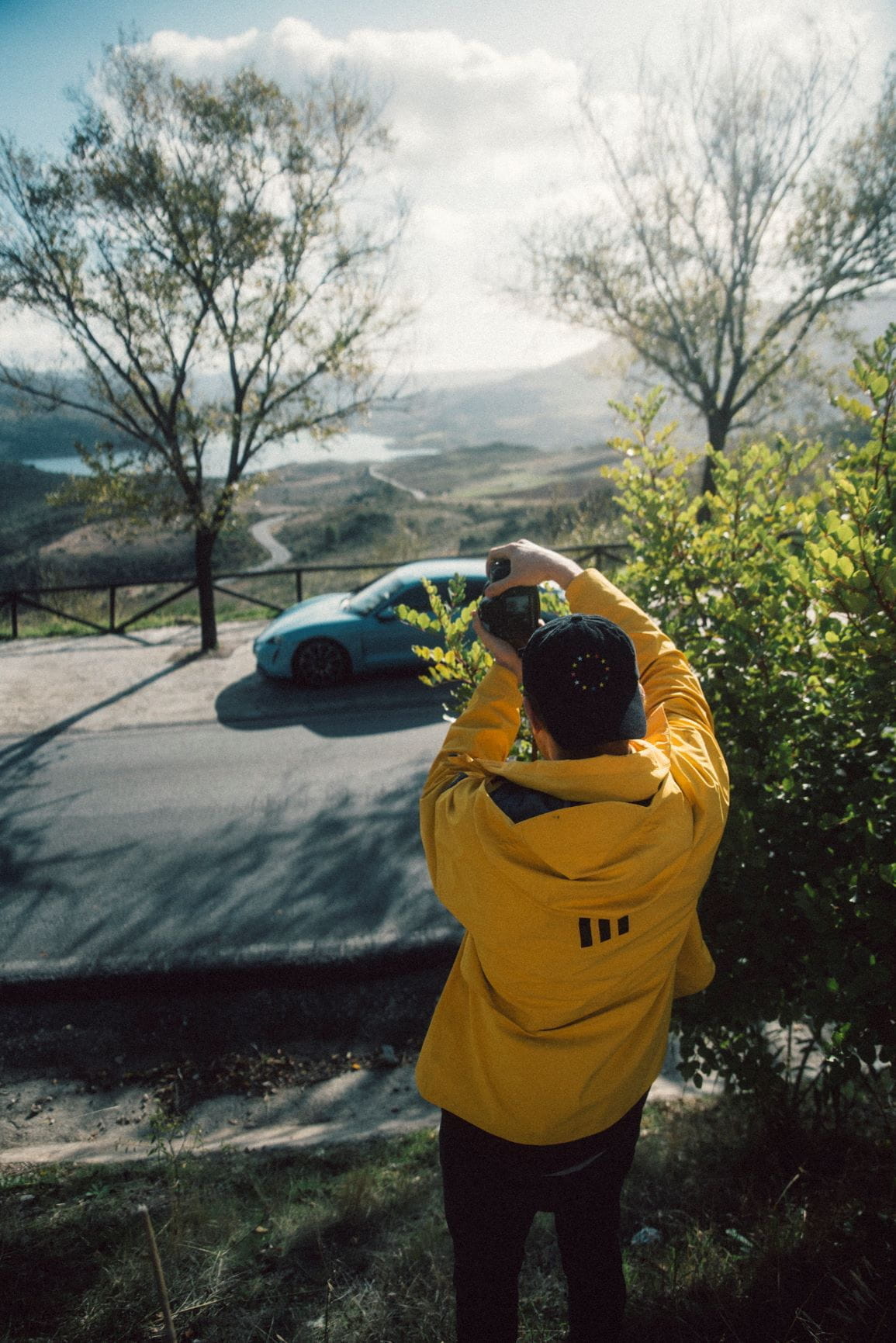 man taking picture from the other side